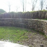 Reclaimed stone curved wall